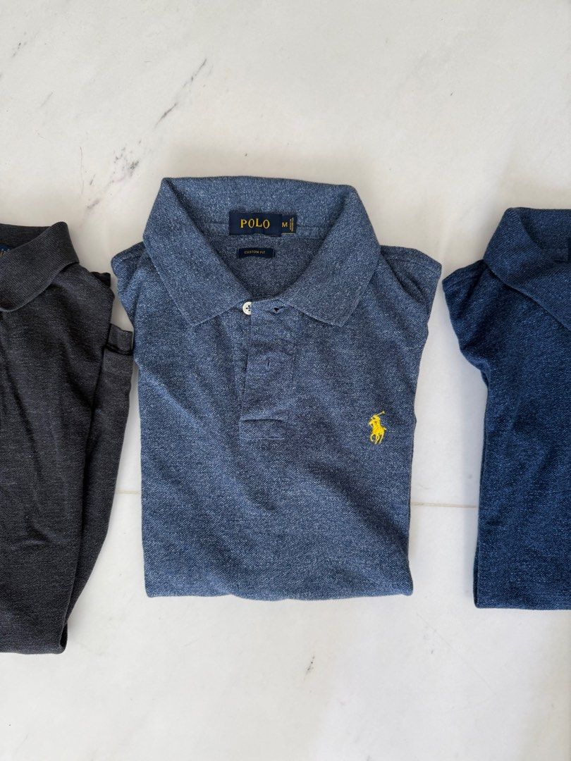 2 Ralph Lauren Polo Shirts - Assorted Colors - Medium (Category: Tshirts & Polo Shirts) located in Singapore. Submitted by eatsandtravels (Listing ID 1378932978, Image 1). Description: Set of Ralph Lauren Polo shirts in various colors. All are size Medium. Two Custom Fit and one Custom Slim Fit. Perfect for casual wear or a smart-casual look. Selling as a set..