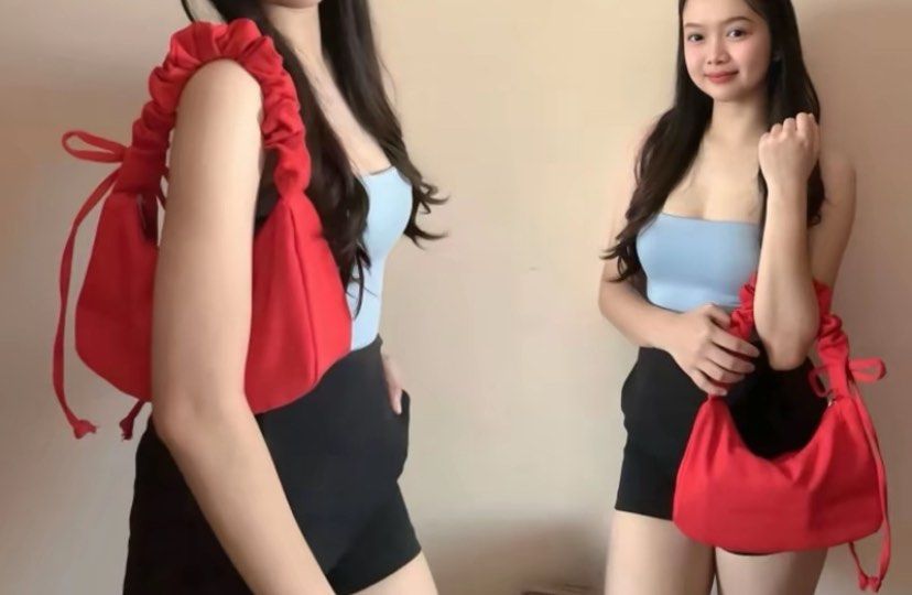 SCRUNCHIE BOW COQUETTE SHOULDER/KILI KILI BAG (Category: Shoulder Bags) located in Quezon City. Submitted by lovedbysari (Listing ID 1378976221, Image 3). Description: •No flaws •Used only once in event •You can adjust it depends on your preference. •Super pretty, add a color to your ootd!😍 •Stylish and practical accessory for your everyday needs. This bag features a zipper that provides security for your belongings and easy access to them. The 