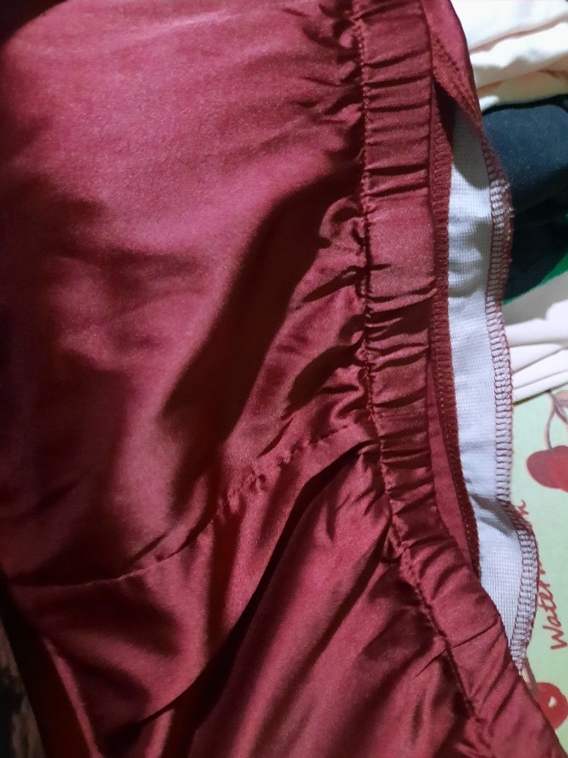 Shein Silk Wine Red Skirt (Category: Skirts) located in Manila. Submitted by anythingoesph (Listing ID 1379106810, Image 3). Description: Skirt is silk, has side zipper 2xl.