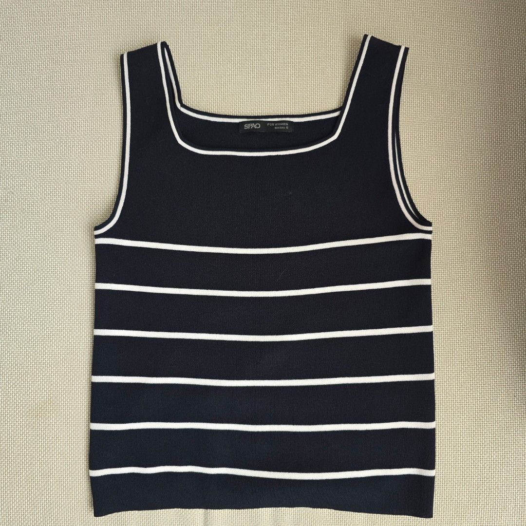 Spao Striped Navy Top (Category: Sleeveless) located in Quezon City. Submitted by ahlexaa (Listing ID 1379001443, Image 2). Description: Brand: Spao Size: S Color: Navy blue Usage: Used once Flaws: None 💸 Payments via Gcash only 🚚 Shipping from QC, via Grab/Lalamove, Gogoexpress. Fee c/o buyer ❌️ No returns or exchanges. All sales are final.