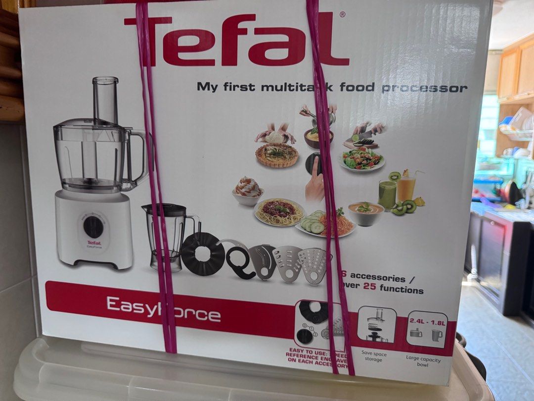 Tefal Easyforce Multi-Function Food Processor (Category: Juicers, Blenders & Grinders) located in Singapore. Submitted by fairieland (Listing ID 1378983908, Image 1). Description: Brand new Tefal Easyforce food processor. Comes with multiple accessories and over 25 functions. Includes a large capacity bowl. Original price was $119. Perfect for various food preparation tasks..