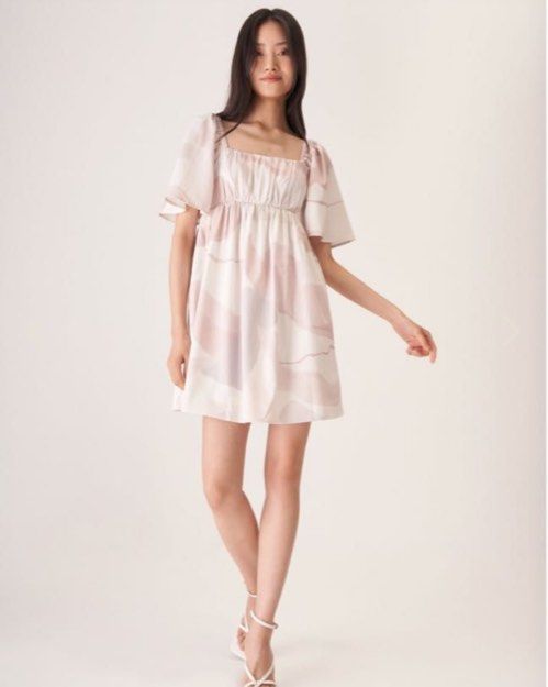 The Closet Lover Nova Babydoll Dress in Oasis Earth (Category: Dresses) located in Singapore. Submitted by ottoke (Listing ID 1379107823, Image 1). Description: Worn once, still in good condition! Adorable babydoll dress from The Closet Lover. Features a flattering square neckline and puff sleeves. The dress is in excellent condition. Perfect for a casual day out or a special occasion. Please refer to the size chart in the images for measurements