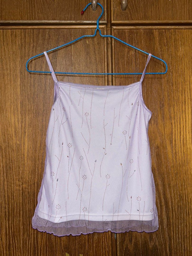 Thrifted y2k purple cami (Category: Blouses) located in Singapore. Submitted by astronaht (Listing ID 1379112497, Image 1). Description: the beads were already faded when i thrifted it but the mesh is in very good condition. i dont reach for this top because (oversharing) it reminds me of a certain person that i dont see anymore Lol. pls help to give this lovely top a new purpose other than haunting me. and at a steal some more! i thrifted it for