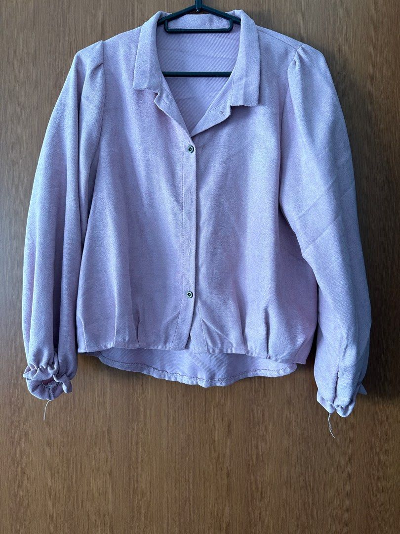 Vintage Pink Blouse with Puff Sleeves (Category: Blouses) located in Singapore. Submitted by clozetlicious (Listing ID 1378923210, Image 1). Description: Lovely vintage pink blouse with a classic collar and button-down front. Features unique puff sleeves and gathered cuffs. Perfect for adding a touch of retro style to your wardrobe. In good condition, ready to wear!.