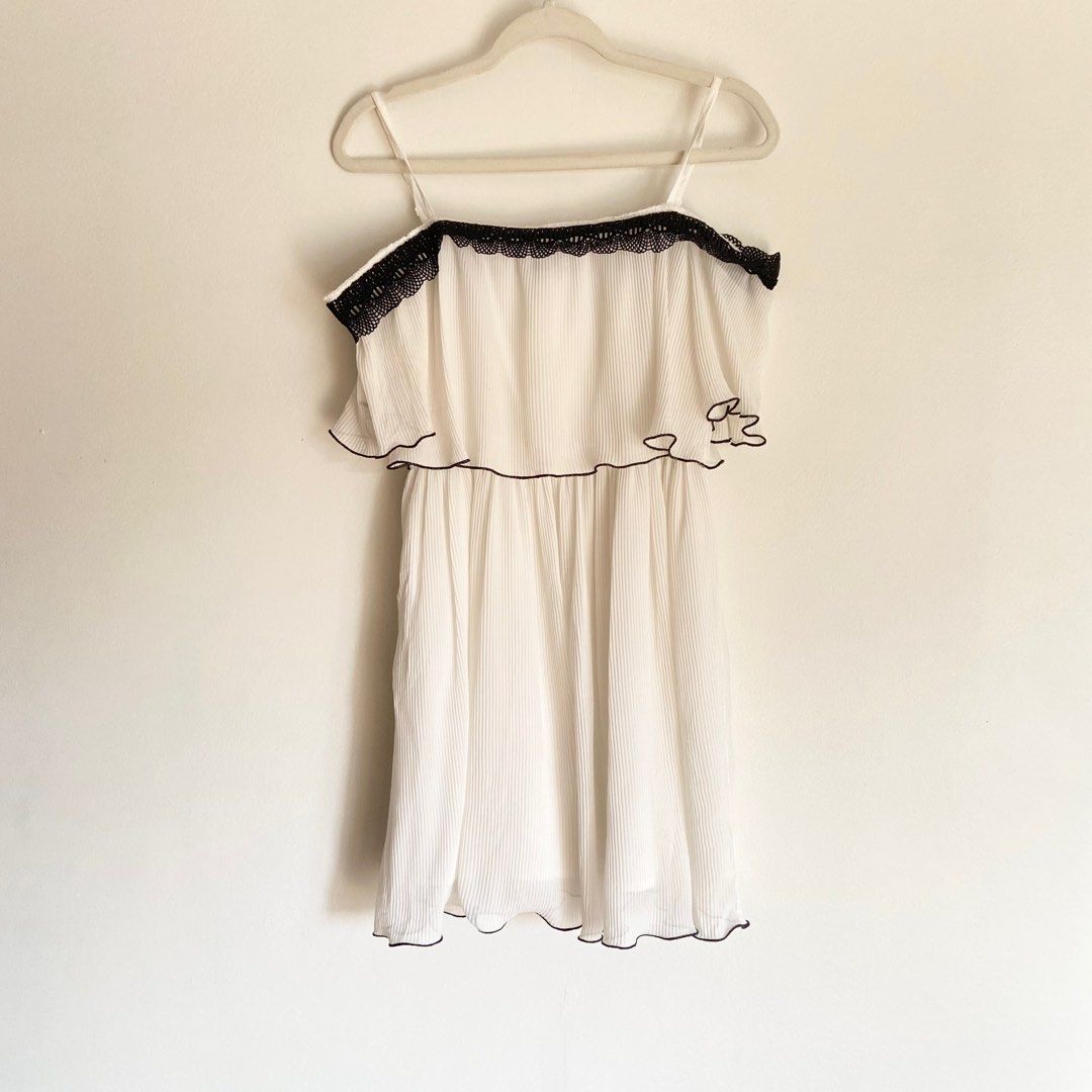 white off-shoulder summer dress (Category: Dresses) located in Quezon City. Submitted by fleurcore (Listing ID 1379083035, Image 1). Description: — perfect for summer or any events! 🤍 — super comfy and flowy — off shoulder w/ strap — best fits small-medium frames 💌 dm for more pics/inquiries (can’t guarantee ww pics but can provide close ups) 🏷️: summer beach island girl graduation dress sunday dress.
