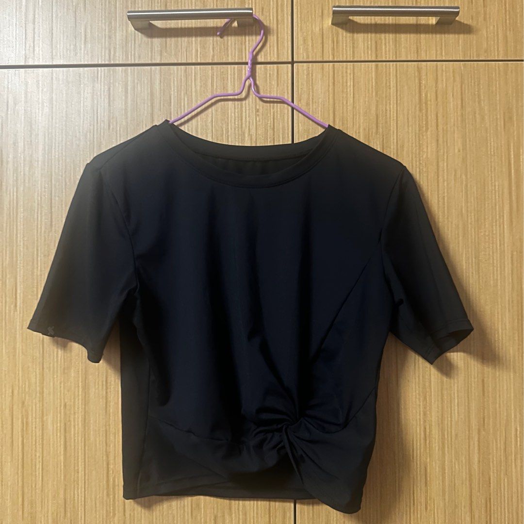 xexymix yoga top (Category: Activewear) located in Singapore. Submitted by jbeomy (Listing ID 1379068497, Image 3). Description: xexymix fresh feather twist crop short sleeve top in black color and pure blue color both size L bought in korea worn a few times but still in very good condition $5 each tags yoga sports active wear tennis pilates spin indoor cycling running exercise short sleeves crop cropped light baby.