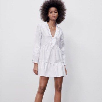 Zara White Long-sleeve Ruffled Dress (Category: Dresses) located in Paranaque City. Submitted by robedeclutters (Listing ID 1379013612, Image 1). Description: Perfect for the beach!! 🤍 multi-tiered dress with ruffle details at the collar :) .