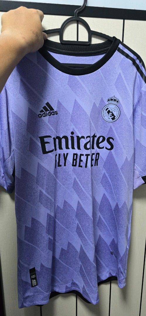 Adidas Real Madrid 2023/24 Third Jersey (Category: Activewear) located in Singapore. Submitted by skymoon36 (Listing ID 1379260238, Image 1). Description: - Official Adidas Real Madrid third jersey for the 2023/24 season. - Features the Emirates Fly Better sponsor logo. - Jersey is in excellent condition. - Perfect for any Real Madrid fan..
