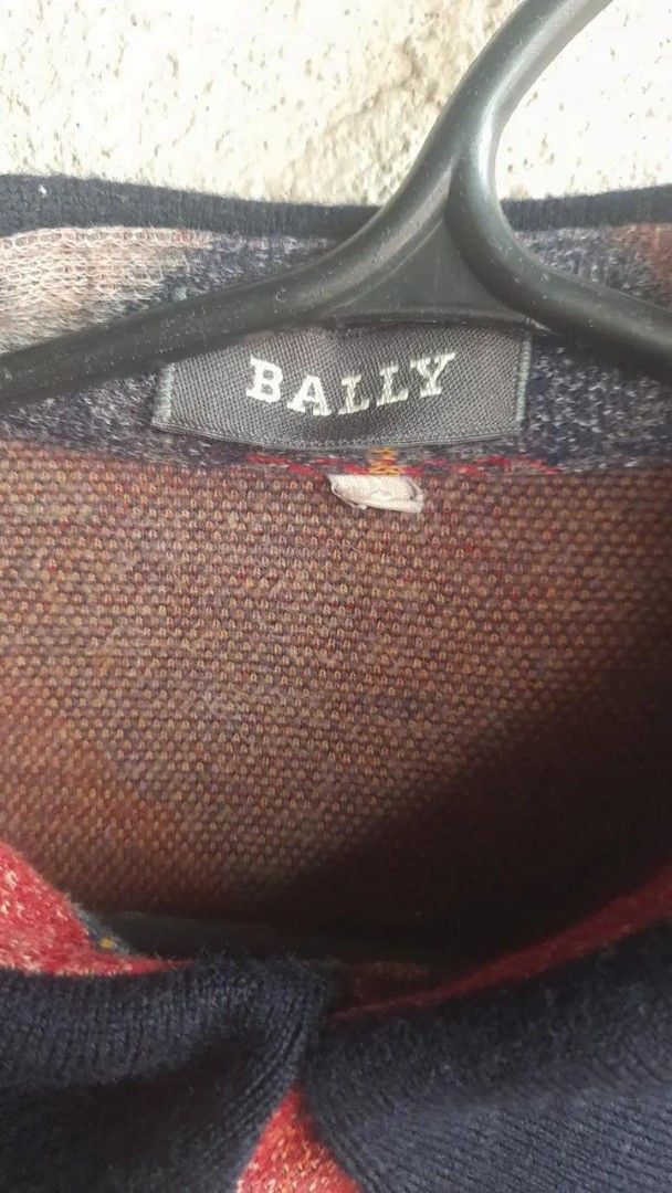Bally Long Sleeve Polo Shirt (Category: Tshirts & Polo Shirts ) located in Manila. Submitted by terrible_things (Listing ID 1379206968, Image 2). Description: Dimes: 21.5" W 27" L 22" Sleeve Can fit M-L Issue: pinholes add sf.