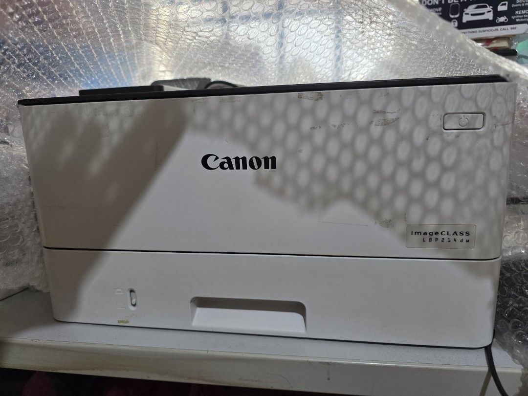 Canon imageCLASS LBP214dw Laser Printer (Category: Printers, Scanners & Copiers) located in Singapore. Submitted by mangosales (Listing ID 1379288728, Image 3). Description: Canon imageCLASS LBP214dw laser printer. Includes a new 052 cartridge. Got from office and have no use for it at home hence selling. price is negotiable just send me an offer. The printer has been tested and is in good working condition. The toner level is at 30%. Comes with 