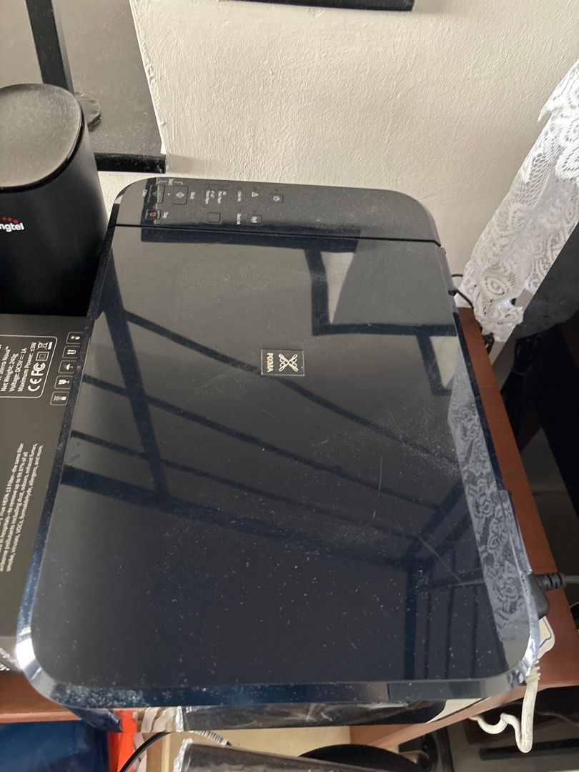Canon PIXMA E560 Inkjet Printer (Category: Printers, Scanners & Copiers) located in Singapore. Submitted by delewithonel (Listing ID 1379174008, Image 2). Description: Canon PIXMA E560 inkjet printer. Black in color. no ink catridge.