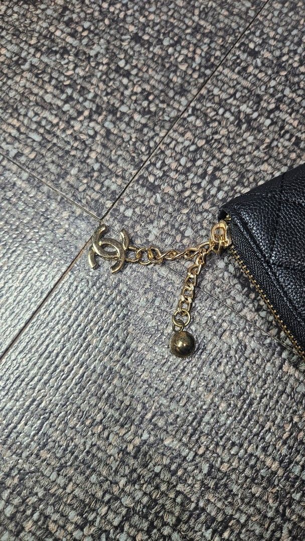 CHANEL Long Wallet (VIP Gift) (Category: Luxury Bags & Wallets) located in Quezon City. Submitted by coolbeans02 (Listing ID 1379310895, Image 3). Description: CHANEL Long Black Wallet VIP Gift (with complete hardware) Perfect condition outside, with signs of use inside (red lining, see images) ₱2000 Message for any questions!.