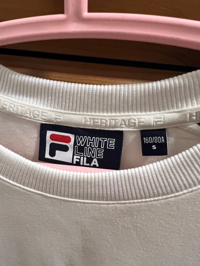Fila pullover (Category: Longsleeves) located in Singapore. Submitted by helpmewithmythings (Listing ID 1379156813, Image 2). Description: Fila pullover, kids size But I am adult size UK 8 and it fits well with allowance Note the small discolouration as shown in pic..