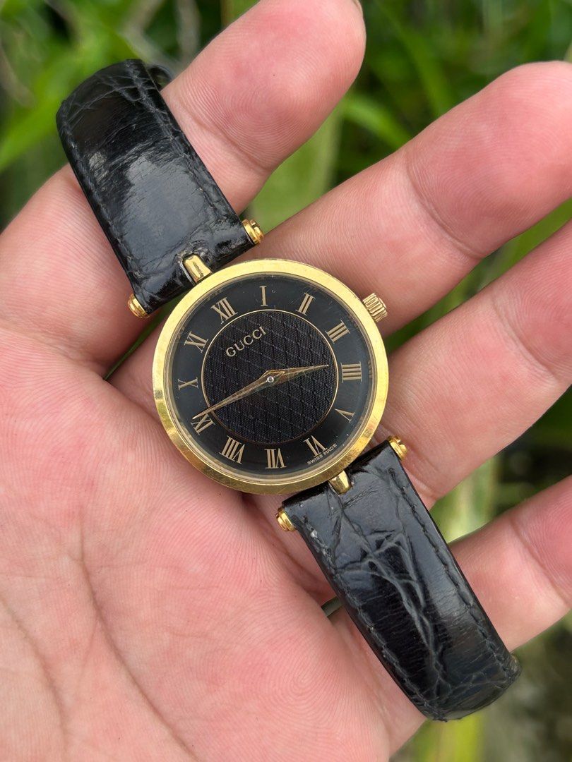 GUCCI (Category: Luxury Watches) located in Manila. Submitted by timer_starts (Listing ID 1379250820, Image 2). Description: Ref: 2000M Size: 30mm Movement: Quartz Case material: Stainless Steel Calfskin Gold Plated Bracelet: Shiny Black Leather Strap Crystal: Acrylic Gold Buckle with Gucci Logo .