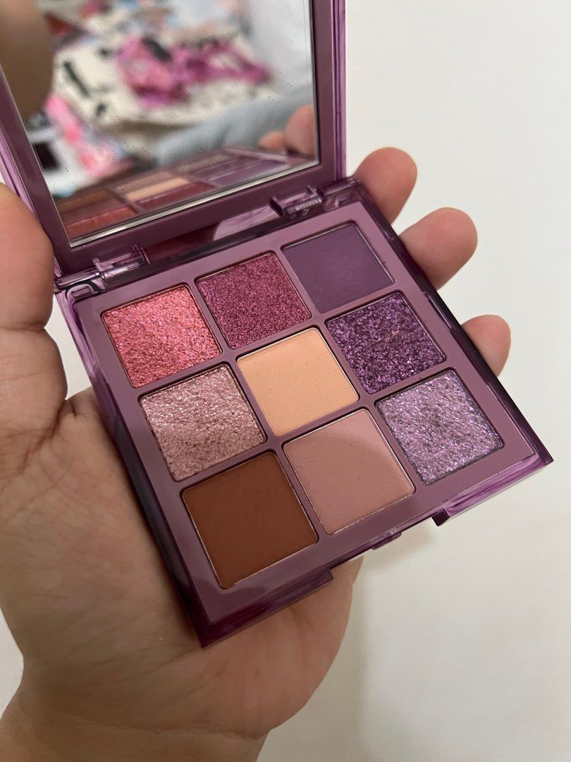 Huda Beauty Purple Haze Obsessions (Category: Makeup) located in Quezon City. Submitted by nugssells (Listing ID 1379234483, Image 3). Description: ‼️FINAL PRICE POSTED – NO HAGGLING. LOW BALLERS WILL BE IGNORED. ‼️ Authentic from the US Barely used, some pans are untouched Retails for 35 usd or P1,900 and already sold out on the websites .