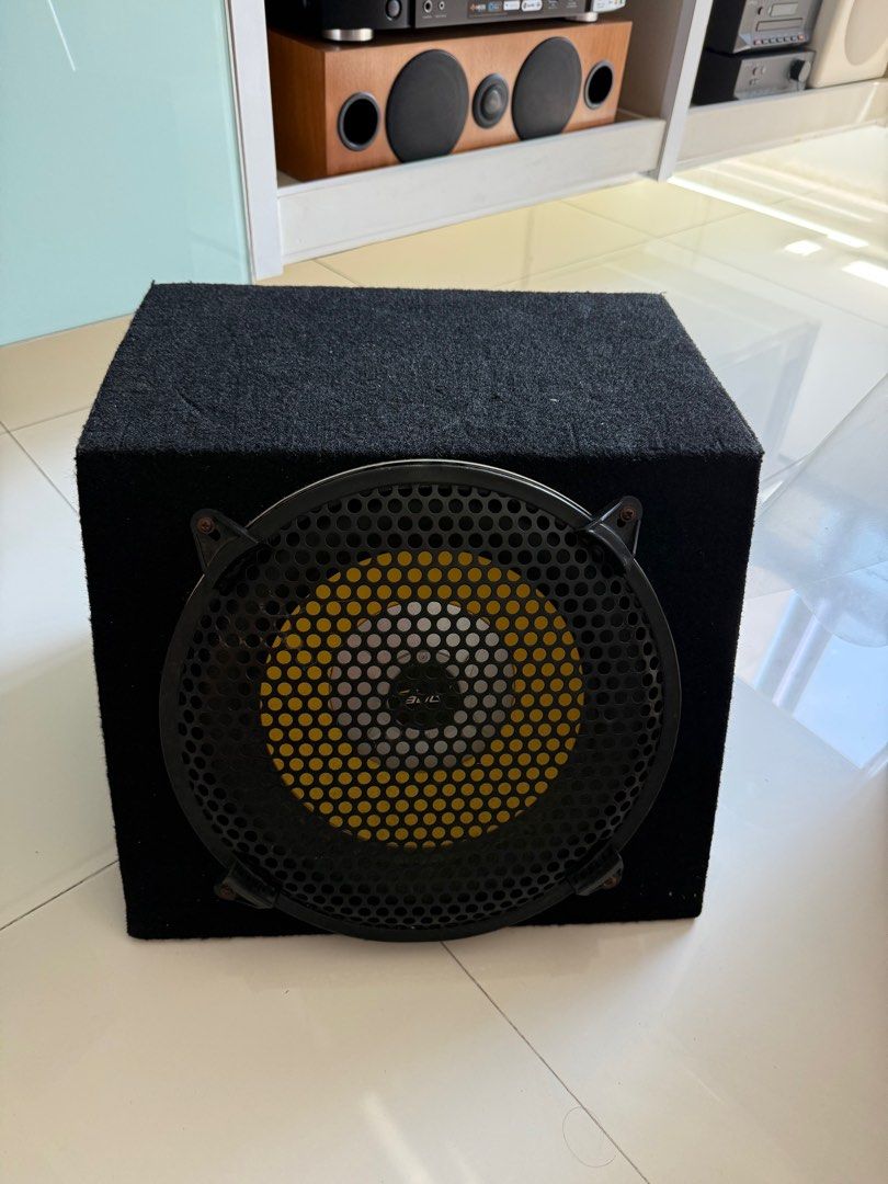 Lightning Audio Bolt 12 inch Subwoofer for Car - Black (Category: Soundbars, Speakers & Amplifiers) located in Singapore. Submitted by esmwei (Listing ID 1379173330, Image 1). Description: Used Lightning Audio Bolt 12 inch passive subwoofer in excellent working condition. Features a black enclosure with a protective grill. The speaker cone has a yellow center. Perfect for enhancing your car audio experience. Please see photos for details..