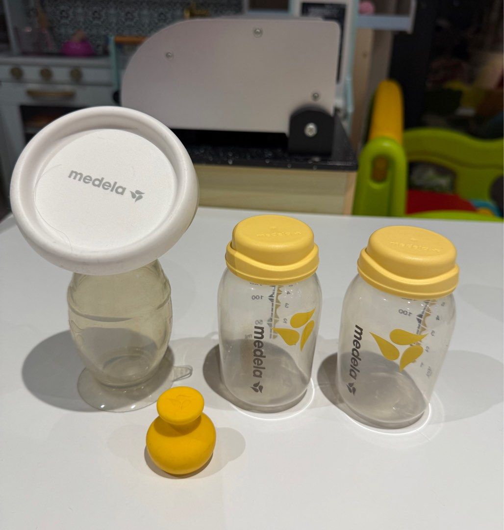 Medela milk catcher and bottles (Category: Breastfeeding & Bottle Feeding) located in Pasig City. Submitted by annerico (Listing ID 1379128035, Image 1). Description: .
