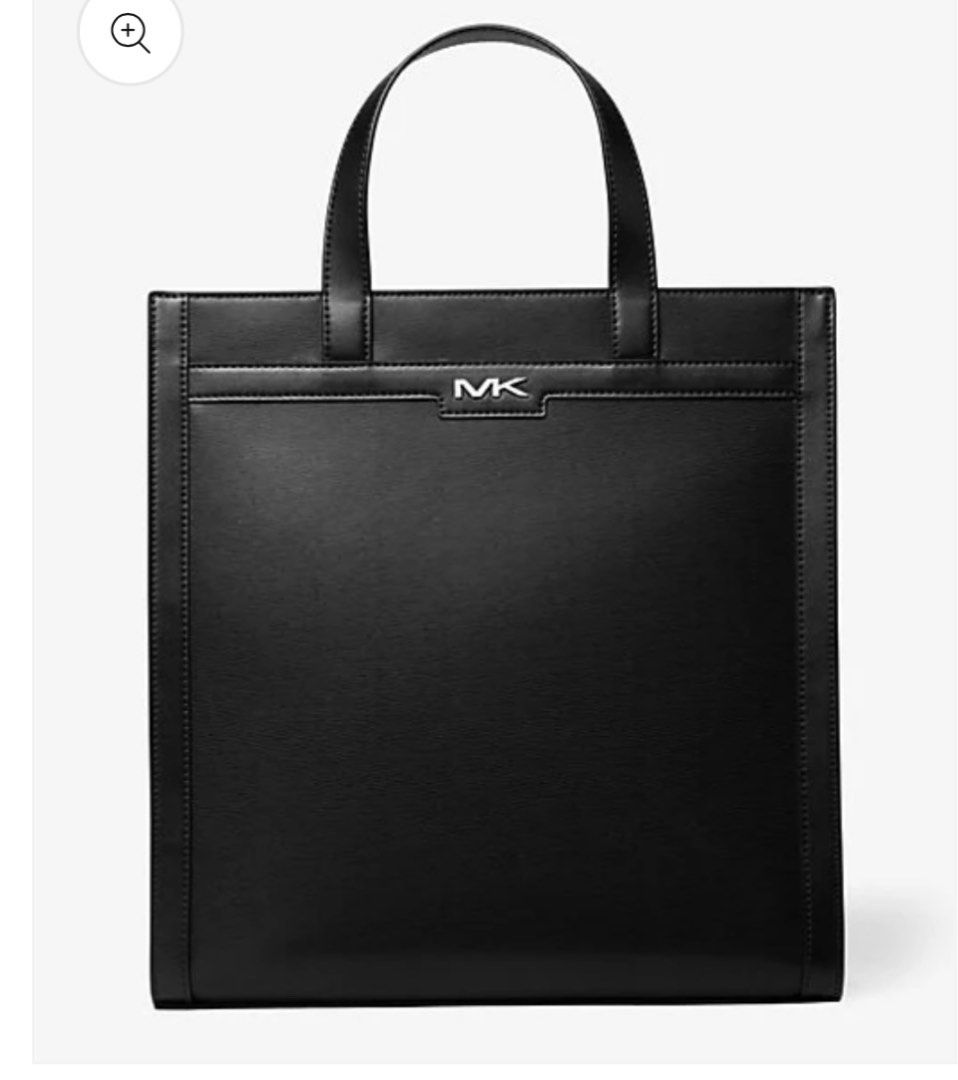 MK COOPER BLACK STRUCTURED TOTE (Category: Laptop Bags & Sleeves) located in Pasig City. Submitted by TheApparels_ph (Listing ID 1379187205, Image 2). Description: AUTHENTIC/ORIGINAL Michael Kors MK Cooper Tote Men’s Large Laptop Bag Black • Tote bag • Polyurethane blend • 60% polyurethane/20% cotton/20% polyester • Gunmetal hardware • 14.2”W X 14.6”H X 5.2”D • Handle drop: 5.5” • Interior details: 2 front zip and slip pockets, laptop compartment