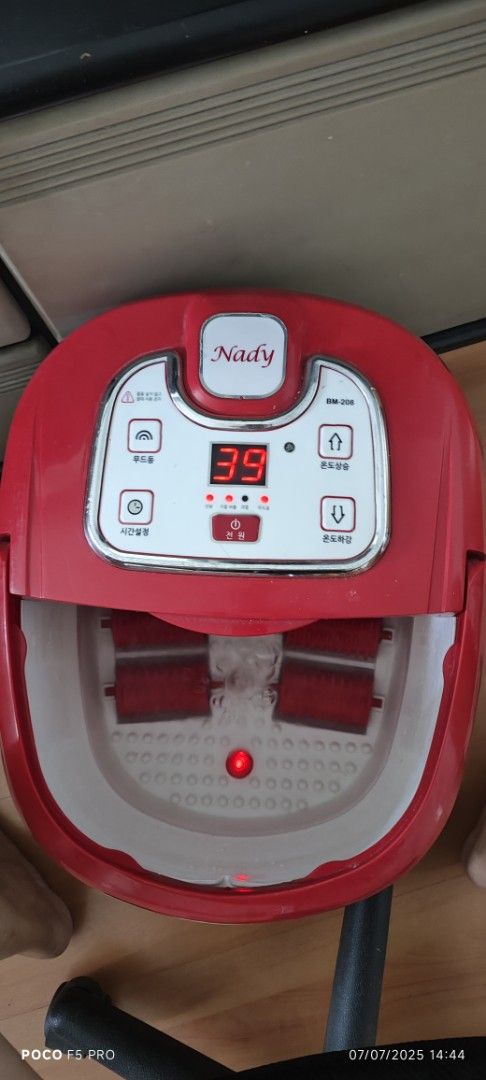 Nady Foot Spa Massager (Category: Massage Devices) located in Singapore. Submitted by 7seater (Listing ID 1379194723, Image 2). Description: - Nady foot spa massager for ultimate relaxation. - Digital display shows temperature. - Includes built-in rollers for a soothing massage. - In excellent working condition. - Self collect at Jurong West..