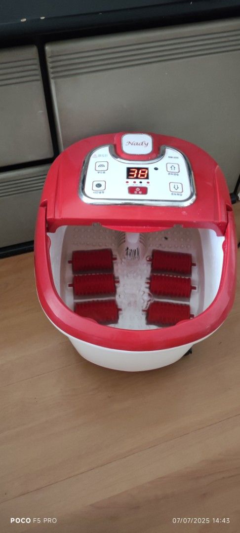 Nady Foot Spa Massager (Category: Massage Devices) located in Singapore. Submitted by 7seater (Listing ID 1379194723, Image 3). Description: - Nady foot spa massager for ultimate relaxation. - Digital display shows temperature. - Includes built-in rollers for a soothing massage. - In excellent working condition. - Self collect at Jurong West..