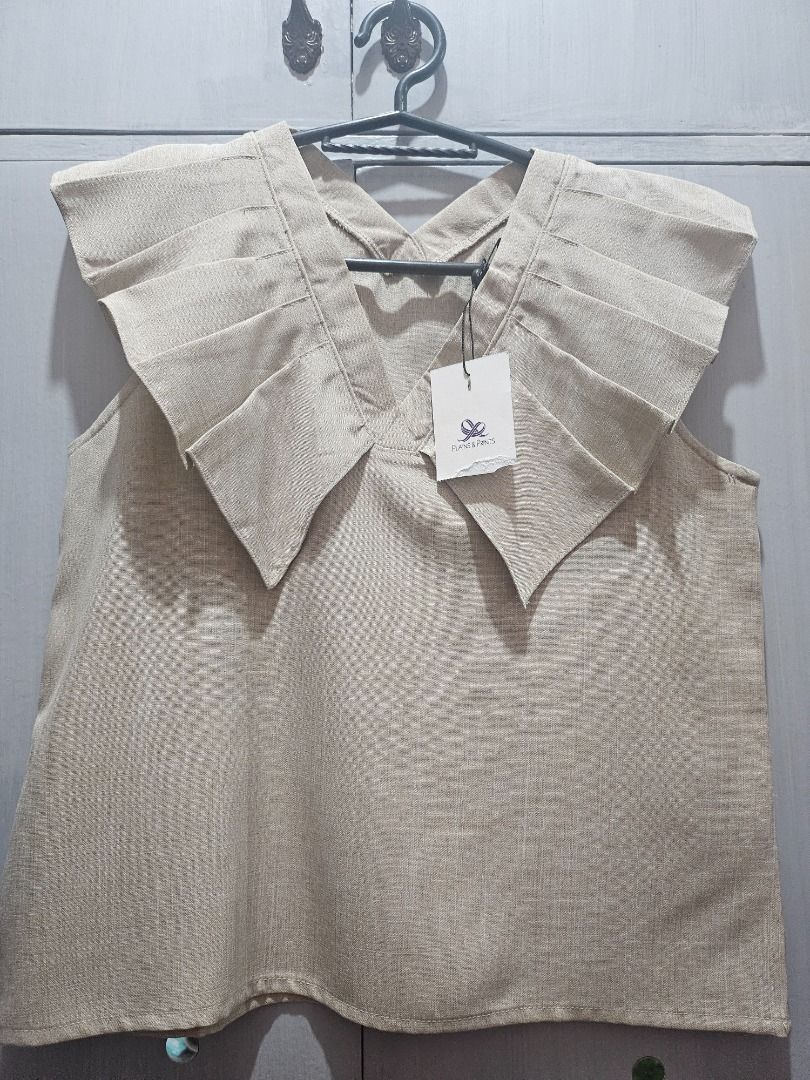 Plains & Prints Yuna Sleeveless Blouse (Category: Blouses) located in Cainta. Submitted by budgetfactory (Listing ID 1379250043, Image 1). Description: ✨ Brand New with Tag: Plains & Prints Statement Blouse ✨ Got this gorgeous top but it just wasn't my style. My loss is your gain! Perfect for the office, a brunch date, or elevating your everyday look. Brand: Plains & Prints Original Price: 1,498 Condition: 10/10, Brand new and never worn. Price t
