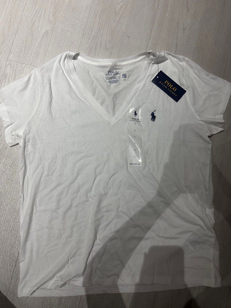 Polo Ralph Lauren V-Neck T-Shirts - New with Tags (Category: Tshirts & Polo Shirts) located in Singapore. Submitted by aashhh (Listing ID 1379253836, Image 2). Description: Brand new Polo Ralph Lauren V-neck t-shirts. Available in multiple colours: green, white, and black. All are size L. Comes with original tags and a Polo Ralph Lauren shopping bag. Receipt available upon request. 1 for $90 , all for $350. No lowballing. Negos allowed .