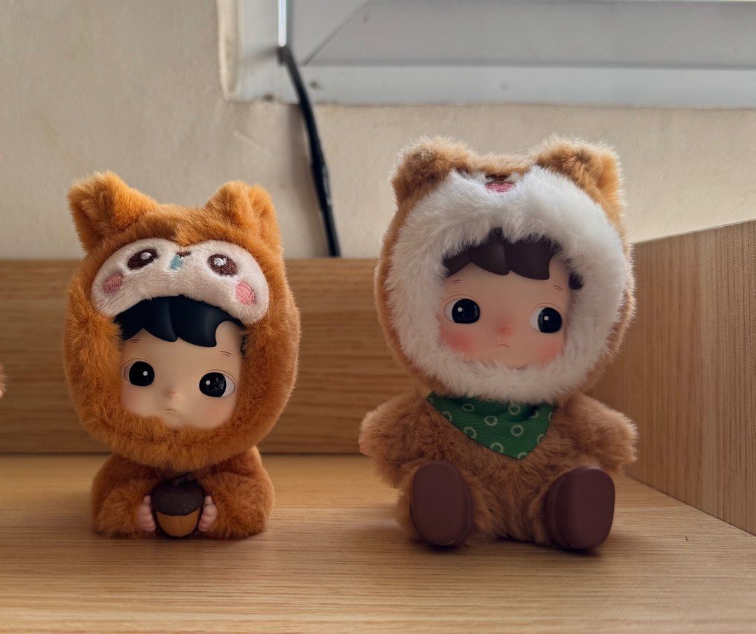 Popmart Hacipupu Snuggle with you (Category: Designer & Blind Box Toys) located in Antipolo. Submitted by camsart04 (Listing ID 1378728270, Image 1). Description: Popmart Hacipupu Snuggle with you - squirrel, puppy - no box - with card - stored in an acryllic case - sold as set rfs: change line Php 800 sf shouldered by the buyer shipping thru Grab, Lalamove or Flash.