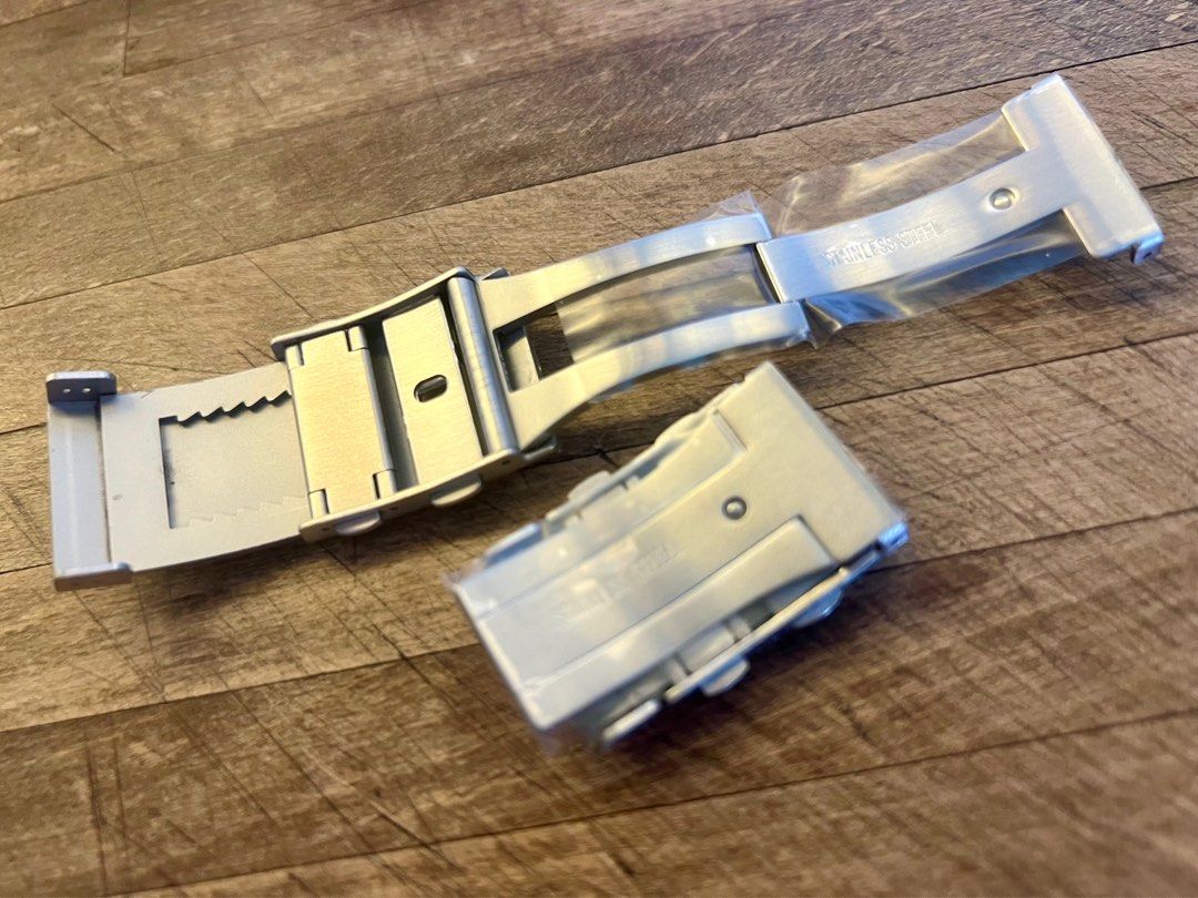 Strapcode Miltat style 22mm 20mm diver dive watch bracelet strap buckle clasp with extension for Sinn U1 U2 Omega uncle Seiko (Category: Men's Watches) located in Singapore. Submitted by property_master (Listing ID 1379196698, Image 3). Description: Upgrade yr Sinn & diver watch with this 316L Solid Stainless Steel Watch Clasp Luxury Push Button Adjustable Folding Buckle Premium Metal Clasp. All are brand new. 1 x 22mm folding clasp just 20$ 1 x 