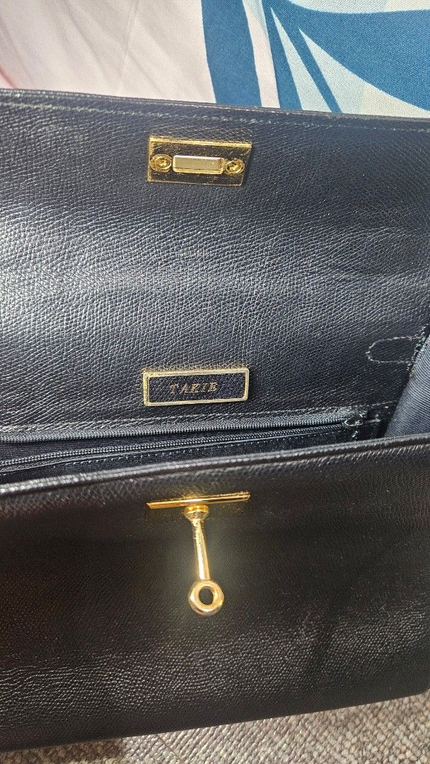 TAKIE Leather Handbag (gold hardware) (Category: Purses & Pouches) located in Quezon City. Submitted by coolbeans02 (Listing ID 1379309870, Image 3). Description: TAKIE Leather Handbag (gold hardware) Still in very good condition Missing lock ₱500 Message for any questions!.