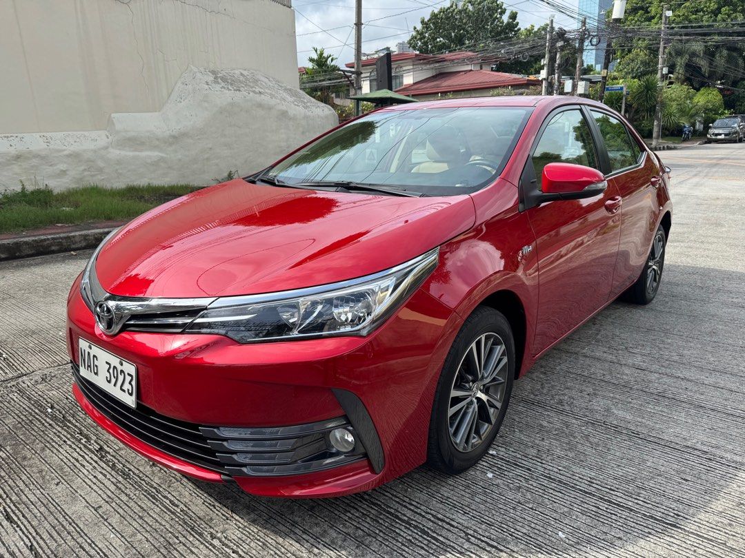 Toyota Corolla Altis 1.6G Auto (Category: Used Cars) located in Quezon City. Submitted by vincelf (Listing ID 1379224810, Image 2). Description: 2017 Toyota Corolla Altis G 1.6Liters Gas 7-Speed Automatic Transmission Color Red, 92TKM All Original, Top Condition Casa Maintained with ABS, Airbags AC Climate & Steering Controls Keyless Entry Remote DRL, Fog Lights Parking Sensors Free New Tint, Matting & LTO Works Very Fresh In & Out Accept 30%DP u
