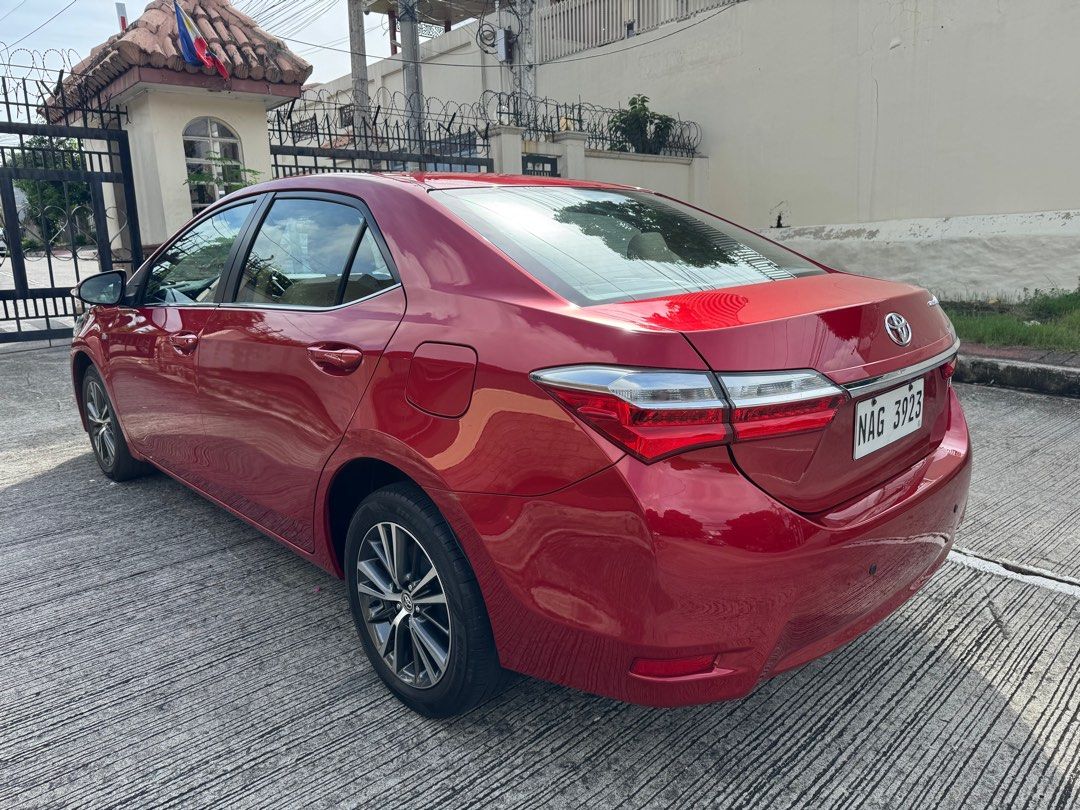 Toyota Corolla Altis 1.6G Auto (Category: Used Cars) located in Quezon City. Submitted by vincelf (Listing ID 1379224810, Image 3). Description: 2017 Toyota Corolla Altis G 1.6Liters Gas 7-Speed Automatic Transmission Color Red, 92TKM All Original, Top Condition Casa Maintained with ABS, Airbags AC Climate & Steering Controls Keyless Entry Remote DRL, Fog Lights Parking Sensors Free New Tint, Matting & LTO Works Very Fresh In & Out Accept 30%DP u