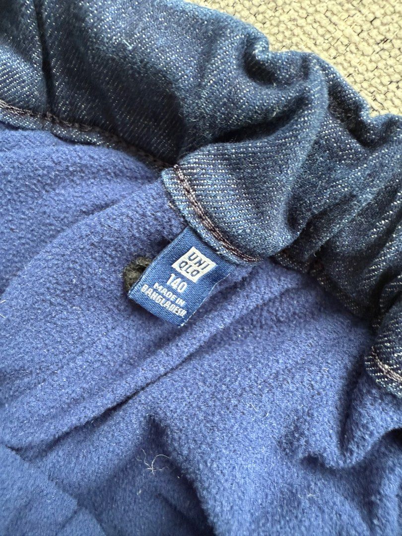 Uniqlo Kids Warm Lined Denim Pants - Size 140 (Category: Babies & Kids Fashion) located in Singapore. Submitted by kluxestyle (Listing ID 1379193896, Image 1). Description: Size 140. Features a Fleece lining for instant warmth. Parachute pants design in denim. Adjustable fit from the elastic waistband. These Uniqlo warm-lined denim pants are perfect for keeping your child cozy. The pants are in excellent condition, ready for a new holiday!.