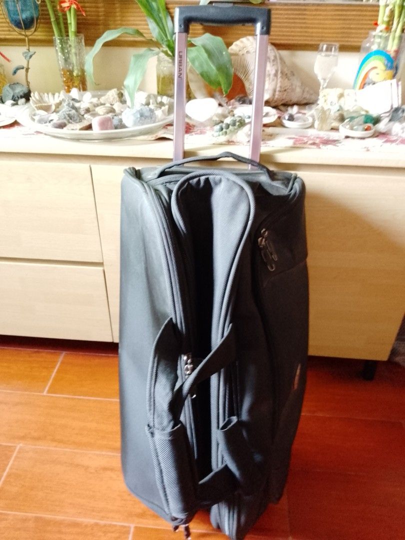 Urban Luggage with handle and wheels (Category: Luggage) located in Pasig City. Submitted by marjukka (Listing ID 1379172537, Image 2). Description: Unused Natago lang ng matagal With collapsible handle and wheels Good condition at maraming pockets Black and Sturdy.