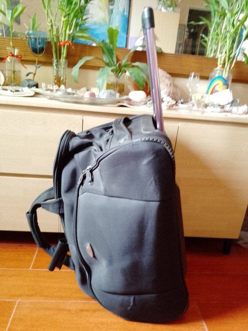 Urban Luggage with handle and wheels (Category: Luggage) located in Pasig City. Submitted by marjukka (Listing ID 1379172537, Image 3). Description: Unused Natago lang ng matagal With collapsible handle and wheels Good condition at maraming pockets Black and Sturdy.