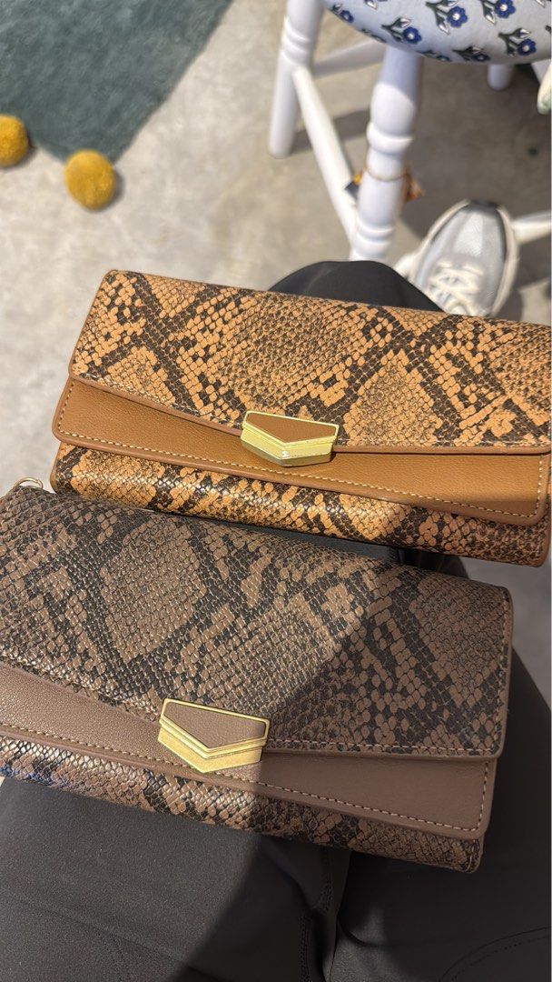 wallets (Category: Wallets & Card holders) located in Kuala Lumpur. Submitted by miglets101 (Listing ID 1379309326, Image 1). Description: wallets - brand new in perfect condition - RM60 each, take two RM100.