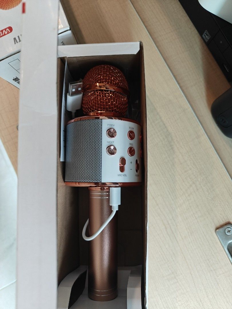 Wireless Microphone for home KTV (Category: Microphones) located in Singapore. Submitted by sellerong (Listing ID 1379184140, Image 3). Description: - Brand new WS-858 wireless microphone - Rose gold color - Comes with charging cable - Built-in speaker - Control buttons for easy use - Perfect for karaoke.