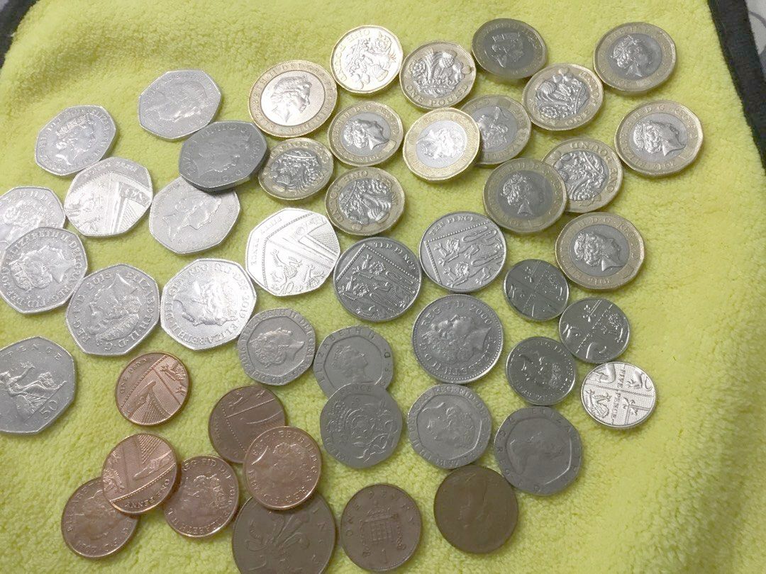 1 Lot UK Coins Assorted (Category: Currency) located in Del Monte. Submitted by bernapi63 (Listing ID 1379434663, Image 2). Description: 1 Lot Various British Coins circulating X 43 pieces total 1 x 2 pounds, 14 pieces x 1 pound various years 10 pieces x 50 pence 4 pieces x 10 pence 5 pieces x 20 pence 1 pc x 10 pence copper 8 pieces x 1 pence copper.