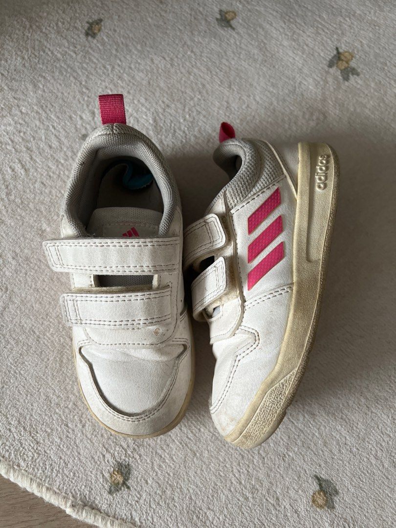 Adidas Toddler Shoes - US Size 8K (Category: Babies & Kids Fashion) located in Singapore. Submitted by bluescluebysu (Listing ID 1379375756, Image 1). Description: - Adidas brand toddler shoes - Size: US 8K - Color: White with pink accents - Velcro straps for easy on/off - Gently used, some yellowing from storage - Suitable for kids Top up $4 for delivery Free with 2 pairs and above purchase See last picture for other listings .
