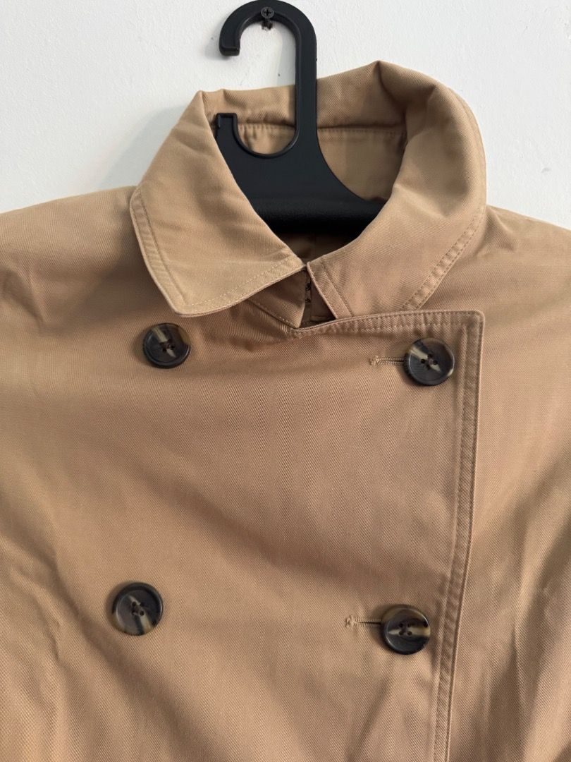 Beige Trench Coat (Water-repellent) (Category: Coats, Jackets and Outerwear) located in Quezon City. Submitted by krloves (Listing ID 1379362900, Image 3). Description: For Sale: TRENCH COAT by MUJI 💦 Water repellent (not-water proof): can with stand some moisture as long as it is not prolonged exposure (this is based on experience). 😇 Minor & Honest flaw: Slight white spot (not noticeable unless you really focus on that area—see zoomed in pict