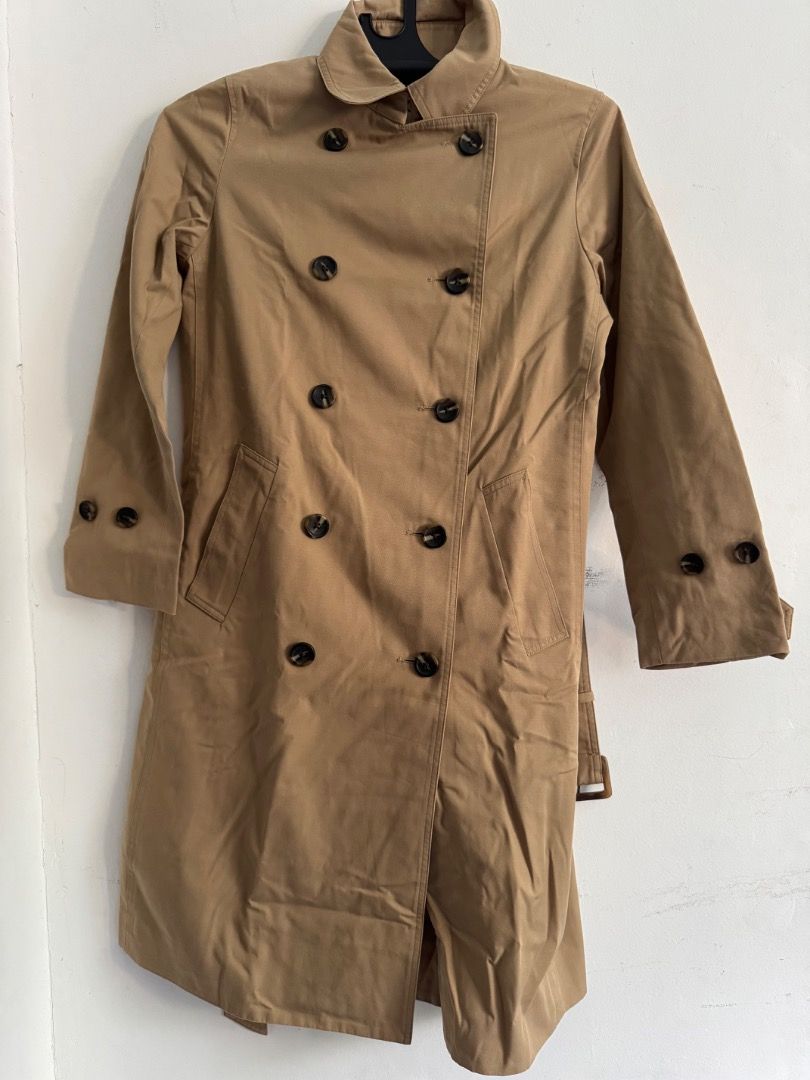 Beige Trench Coat (Water-repellent) (Category: Coats, Jackets and Outerwear) located in Quezon City. Submitted by krloves (Listing ID 1379362900, Image 2). Description: For Sale: TRENCH COAT by MUJI 💦 Water repellent (not-water proof): can with stand some moisture as long as it is not prolonged exposure (this is based on experience). 😇 Minor & Honest flaw: Slight white spot (not noticeable unless you really focus on that area—see zoomed in pict