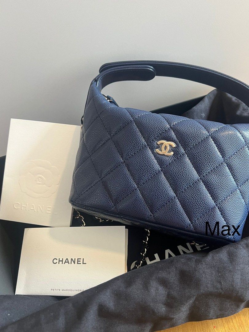 Chanel 25B Quilted hobo Navy Blue (Category: Bags & Wallets) located in Singapore. Submitted by maxeee (Listing ID 1379454918, Image 1). Description: Brand new Chanel 25B Quilted hobo bag in navy blue. Comes with original packaging and authenticity cards. Features a quilted design and a chain strap. A timeless and elegant piece..
