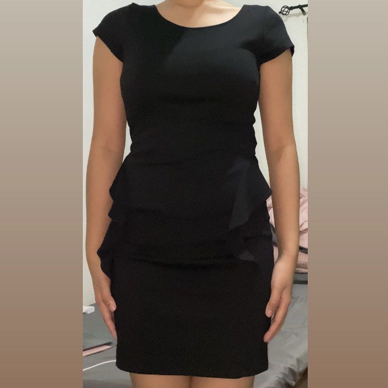 Chic Black Bodycon Pemplum Dress (Category: Dresses) located in Laoag. Submitted by yve__ (Listing ID 1379445454, Image 1). Description: Condition: Never been used. still with tag Size: XS-S Color: Black Best for Occasions, Formal events, Office wear, Classy Night Out Detail: Smooth, comfortable stretch fabric, peplum ruffle accents on both sides, Back zipper closure, Above-the-knee length PRICE IS NEGOTIABLE! Payment first. Please note that the 