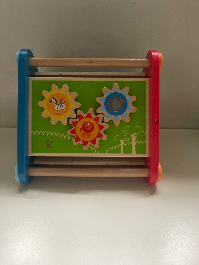 Hape Take-Along Activity Box (Category: Infant Playtime) located in Bulacan. Submitted by sellined (Listing ID 1379396053, Image 2). Description: Last price Original Price ₱2,400+ This 5-sided activity box has moving gears, balls, blocks, and a maze, plus colors, motion, and a mirror to reflect your child’s smile..