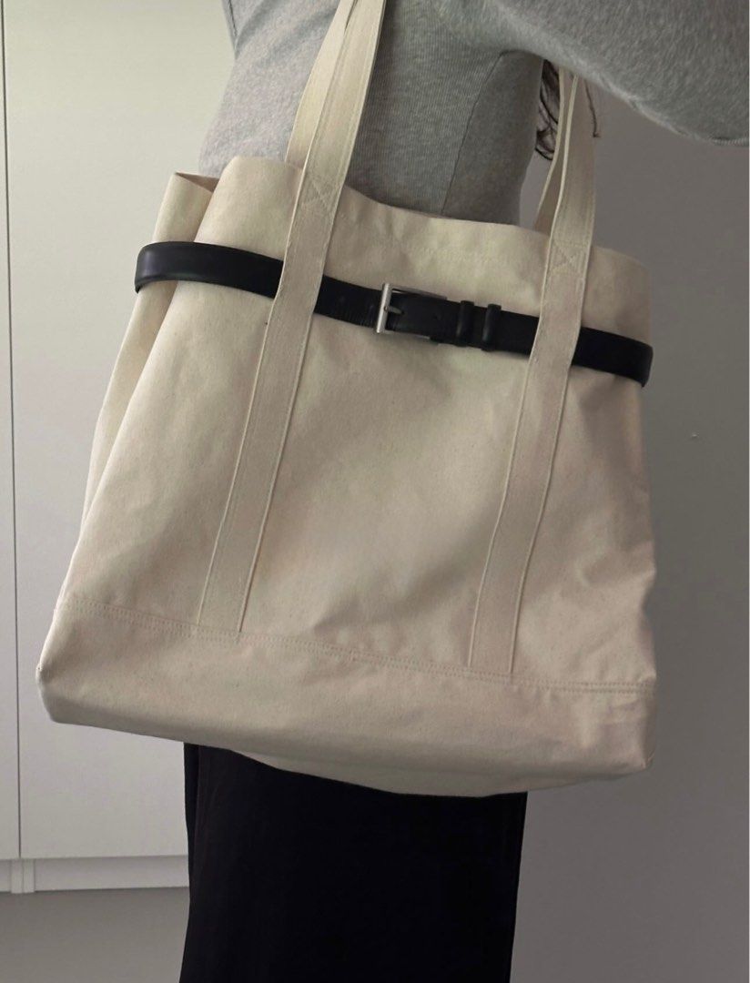 IC: Canvas Tote Bag (Category: Tote Bags) located in Iloilo. Submitted by randomoddling (Listing ID 1379476786, Image 1). Description: Please send me a message for interest. I’ll release this after I get 20 interested serious buyers who are willing to pay first (ETA is 10 days) Additional Feature: Pocket sleeve on the front part of the bag for easy access Monogram is accepted. Belt is included. Belt color is included but style can vary depending 