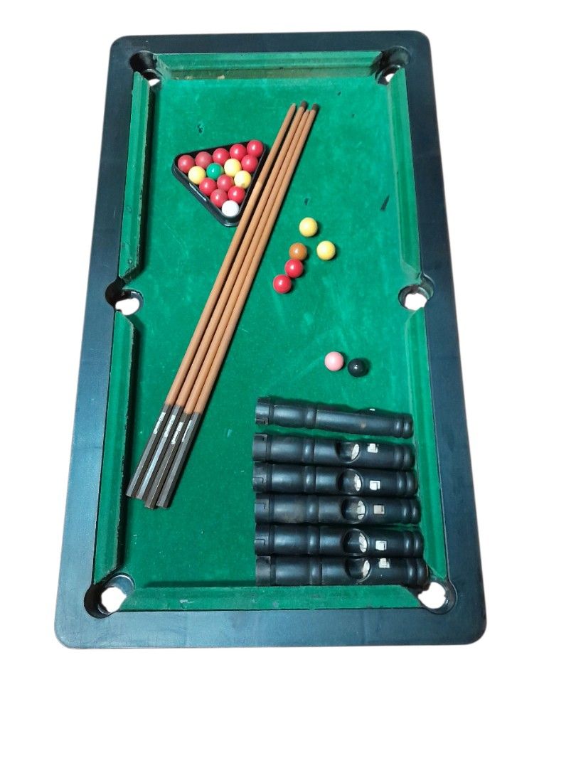 Mini Billiard Playset (Category: Kids Toys) located in Mandaluyong City. Submitted by twixie94147 (Listing ID 1379348244, Image 1). Description: Size of billiard table: Length = 26 inches Width = 14 1/2 inches.
