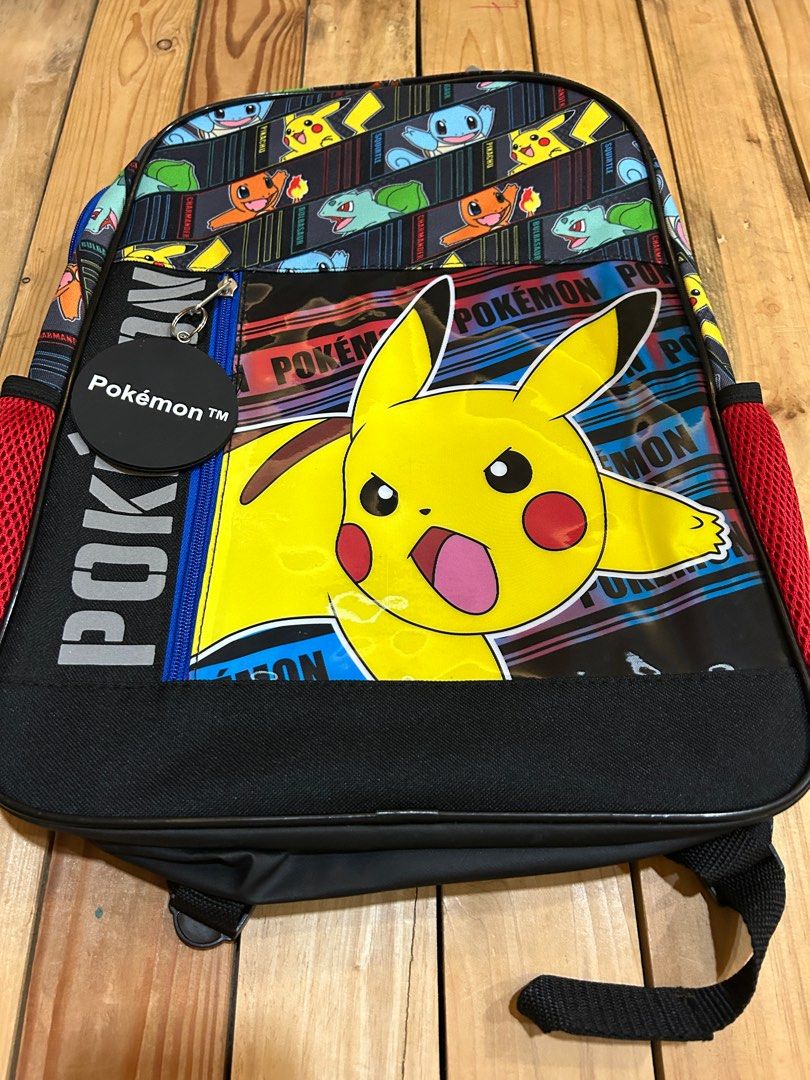 Pokemon backpack (Category: Other Babies Going Out Needs) located in Lipa City. Submitted by lifestyled (Listing ID 1379379107, Image 1). Description: Brand new with tags 2024 New lightweight backpack w/ outer zip pocket, 2 red mesh side pockets, pokeball, main area zipper opening, inside large sleeve pocket w/Pokémon & friends on it, inside main large compartment, adjustable straps w/Pokémon on it, 360 highly visible reflective strips, supports 