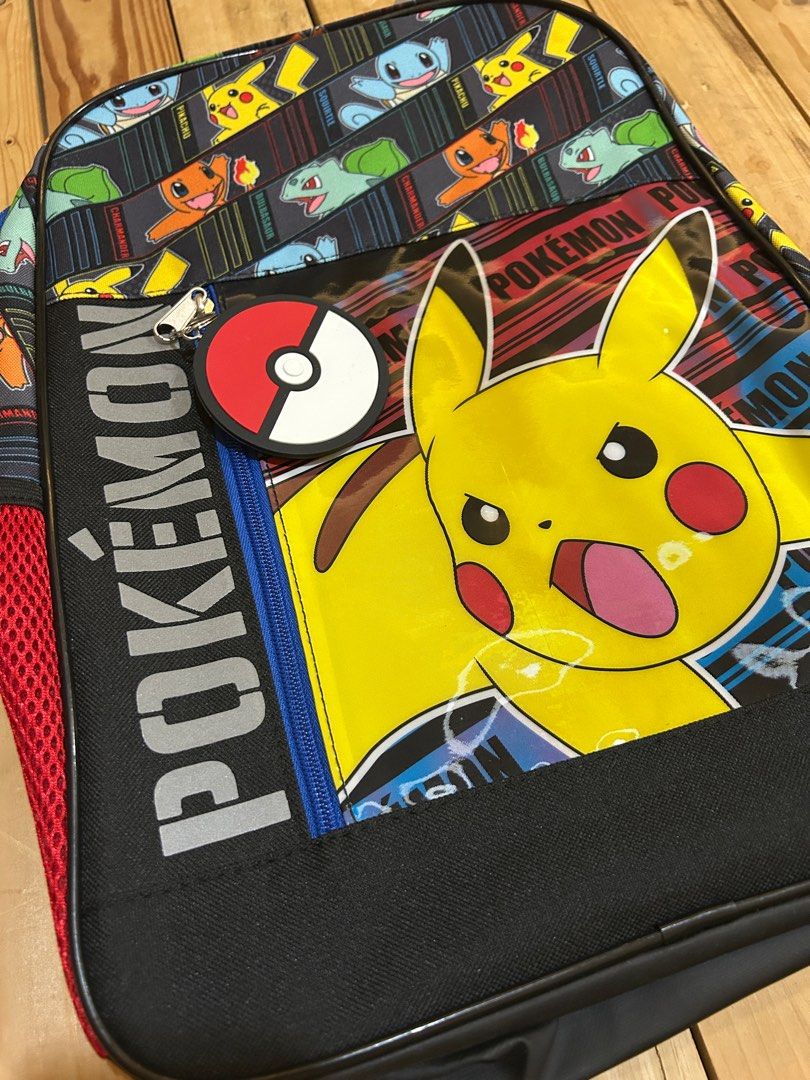 Pokemon backpack (Category: Other Babies Going Out Needs) located in Lipa City. Submitted by lifestyled (Listing ID 1379379107, Image 2). Description: Brand new with tags 2024 New lightweight backpack w/ outer zip pocket, 2 red mesh side pockets, pokeball, main area zipper opening, inside large sleeve pocket w/Pokémon & friends on it, inside main large compartment, adjustable straps w/Pokémon on it, 360 highly visible reflective strips, supports 
