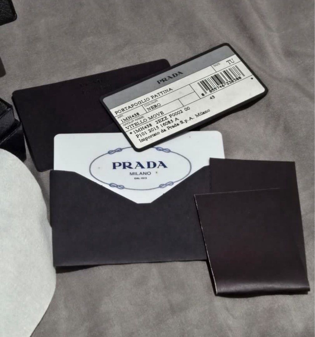 Prada Portafoglio Pattina Wallet (Category: Luxury Bags & Wallets) located in Cabanatuan. Submitted by krnlim (Listing ID 1379393934, Image 3). Description: Portafoglio Pattina Wallet Color: Nero Size: TU Preloved Authentic Prada Wallet Wrislet Complete with authenticity card, box and unused strap for wrist..