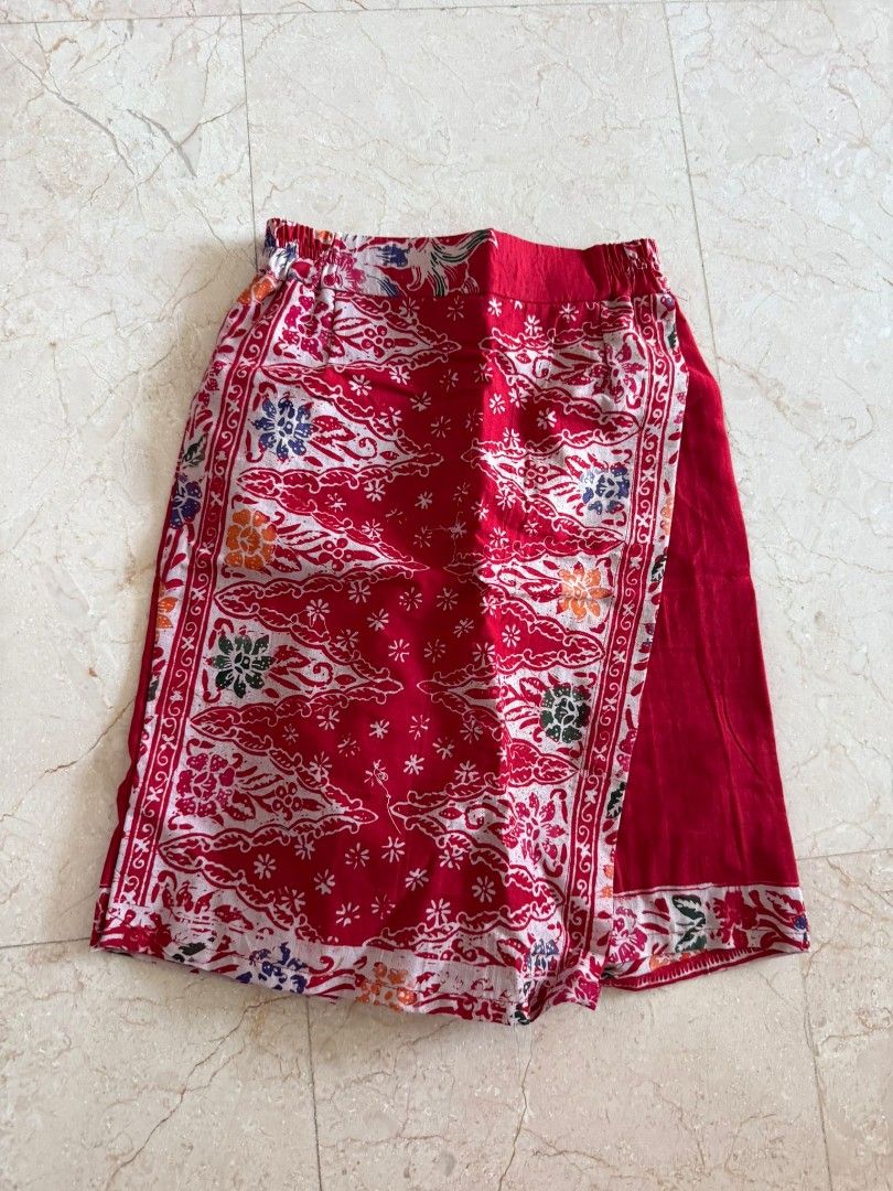 Red Batik Skorts (Category: Skirts) located in Singapore. Submitted by batikliem (Listing ID 1379516708, Image 1). Description: - Red wrap skirt with unique batik print - Comfortable elastic waistband - Perfect for casual wear and summer vacations - Lightweight and flowy fabric.