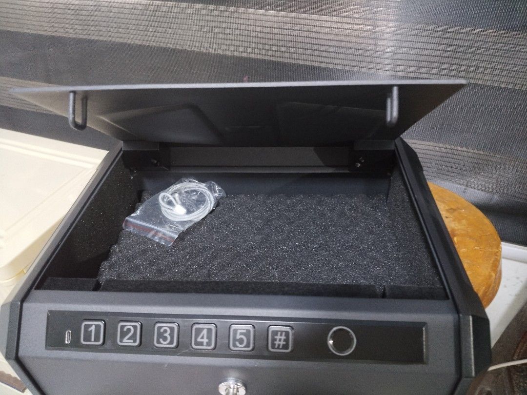 Safety Vault for Hand Guns (Category: Safe) located in Caloocan City. Submitted by 5veezonlineshoppe (Listing ID 1379487045, Image 2). Description: Gun Vault Car Gun Vault Digital Safety Vault for Hand Guns Inside LED Lightning Fingerprint Manual Key Digital Code can be Mounted External Dimension 14.2 x 11.3 x 3.9 inches L x W x H Internal Dimension 14.1 x 9.3 x 3.7 inches L x W x H for inquiries you may contact us at #gunvault #gunsafes #safetyv